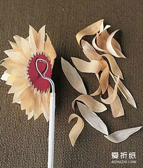 如何制作美丽纸花 手工纸花的做法图解- www.aizhezhi.com