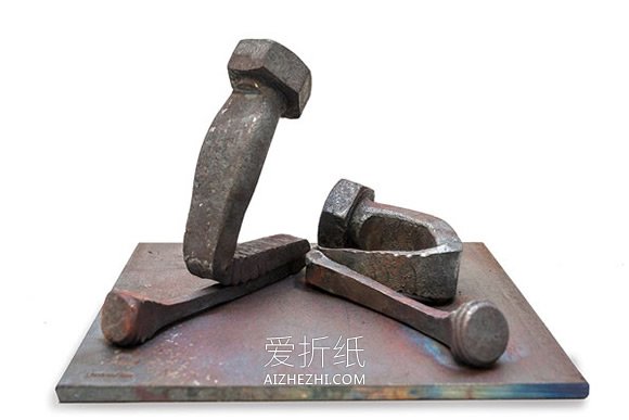 报废钉子怎么变废为宝 废钉子制作人物雕塑- www.aizhezhi.com